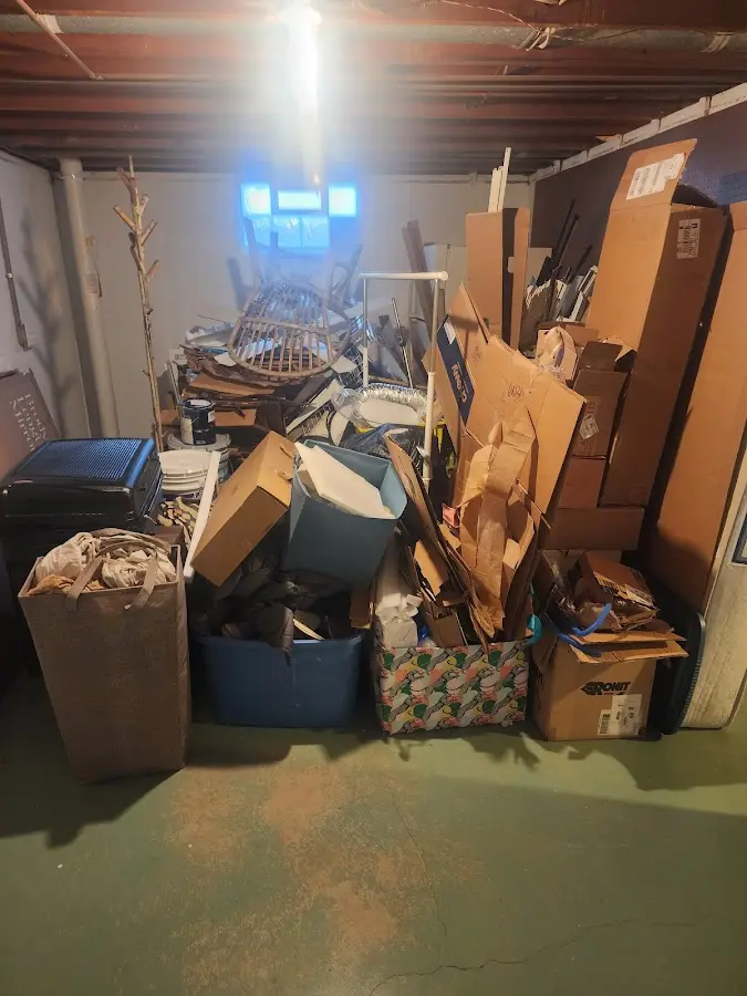 Roll-off dumpster container at job site for 4 Yard Dumpster Rental in Glastonbury